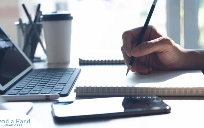 A man studies, representing how professional caregivers should continue to try and learn.